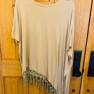 Asymmetrical tassel top. Very cute and comfortable.